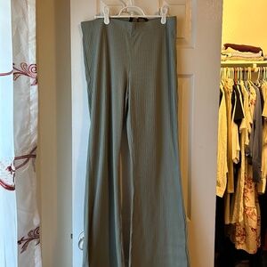 Green flared leggings